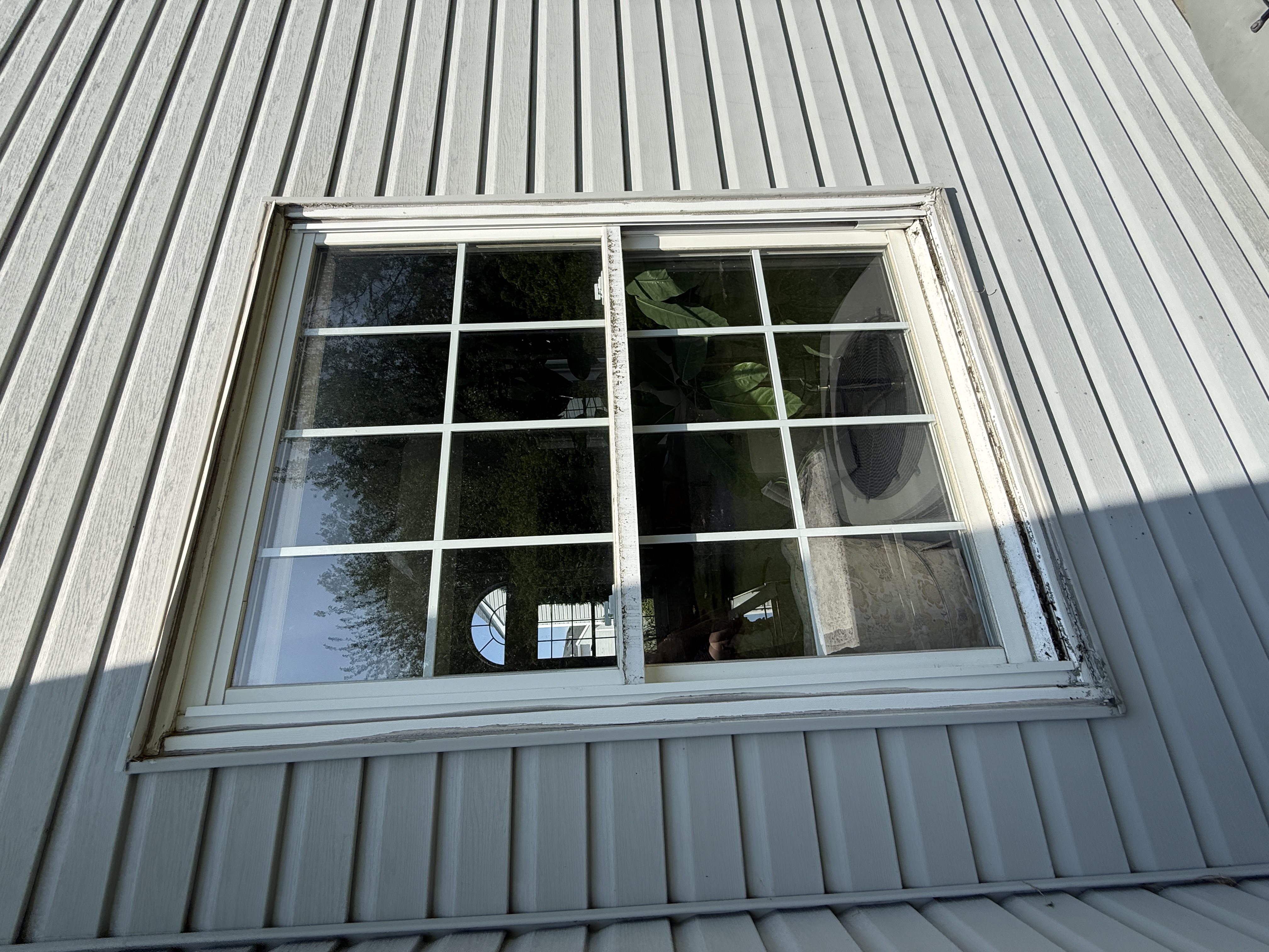 White exterior window with clear glass